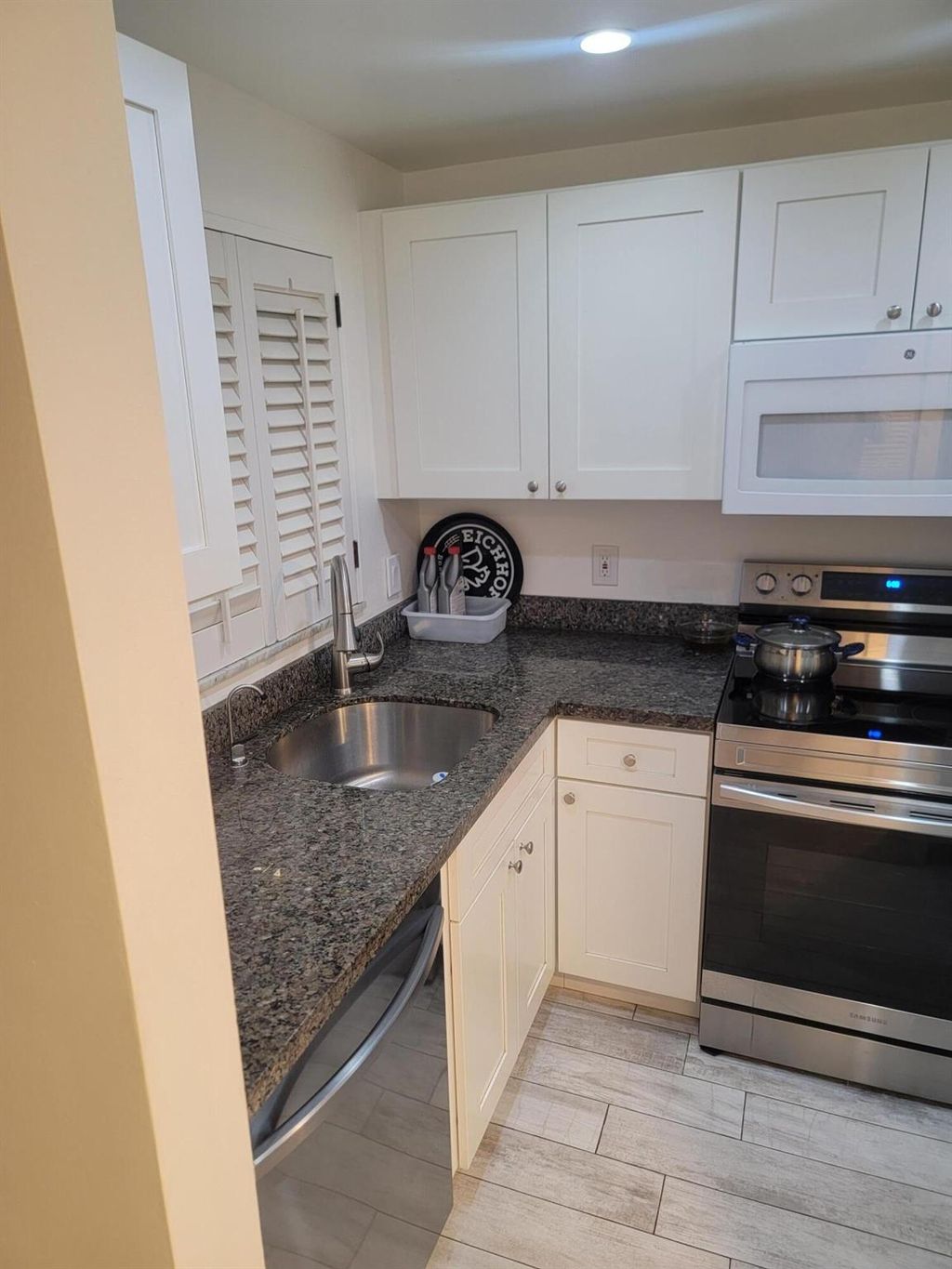 Photo of 1638 Embassy Dr #202 Drive, West Palm Beach, FL 33401 (MLS # R11034830)