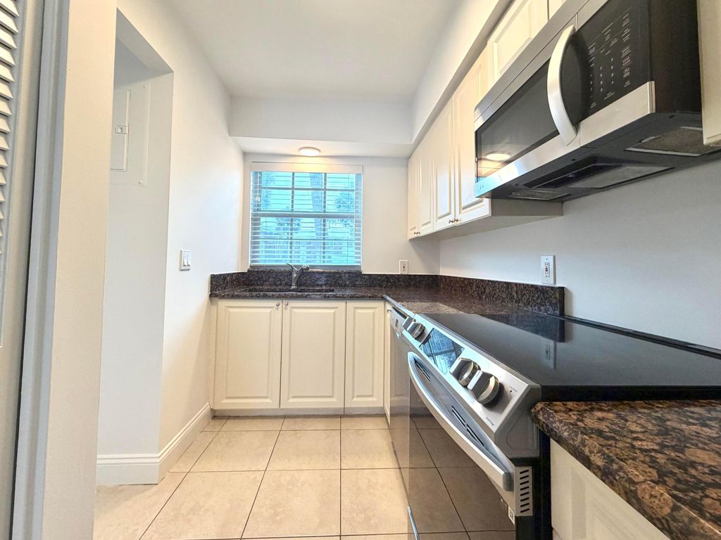 Photo of 413 N Cypress Drive, Jupiter, FL 33469 (MLS # B26034451)