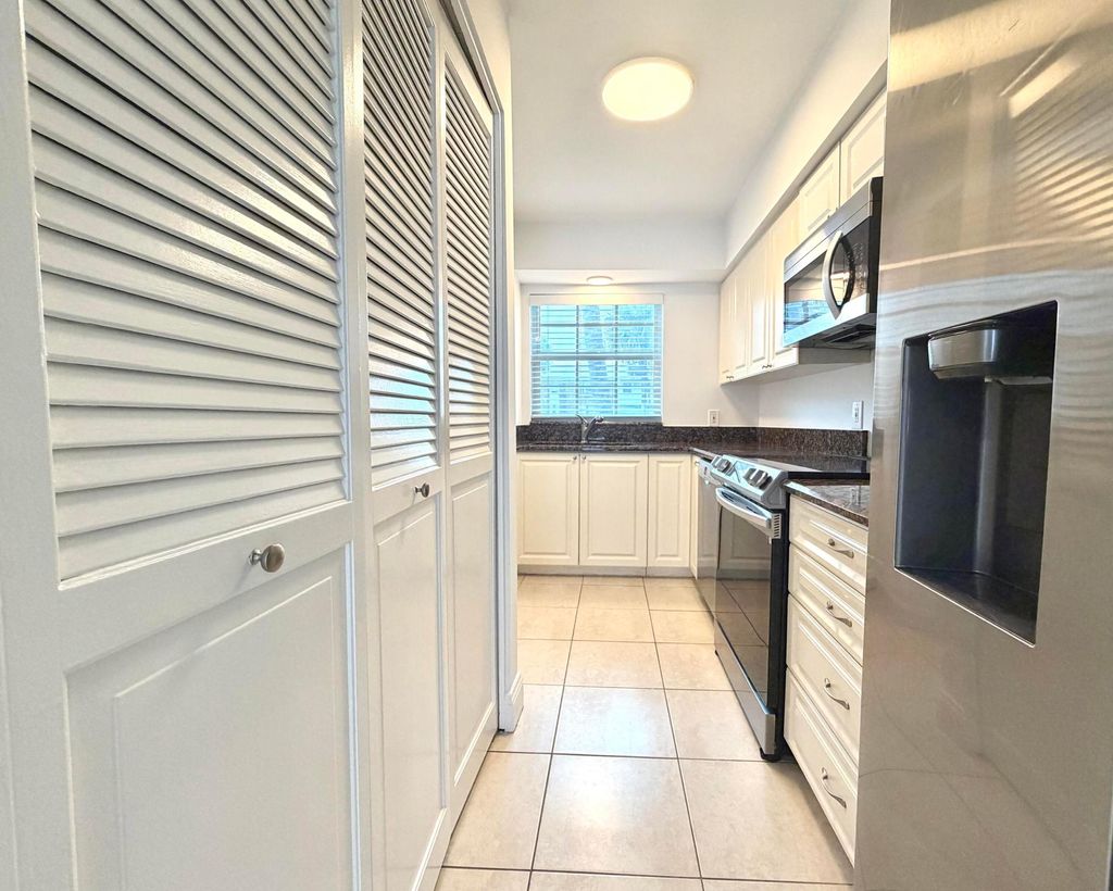 Photo of 413 N Cypress Drive, Jupiter, FL 33469 (MLS # B26034451)