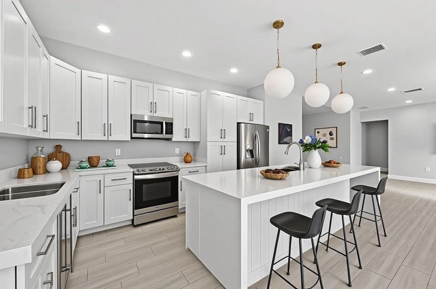 Presenting 1508 E River Dr, a beautifully crafted 2024 new construction residence offering modern elegance and effortless living. This light-filled home showcases a sophisticated open-concept design, expansive living spaces, and refined contemporary finishes throughout. Built to today’s standards, it offers the comfort and peace of mind of brand-new construction with energy-efficient systems and pristine condition. The private outdoor space provides the perfect setting to relax or create your own custom retreat. Ideally located near premier shopping, dining, and major highways, this exceptional home offers a rare opportunity to own newer construction with lasting value and timeless appeal.