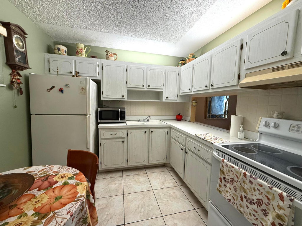 Photo of 2855 GARDEN Drive S #306, Palm Springs, FL 33461 (MLS # B26093020)