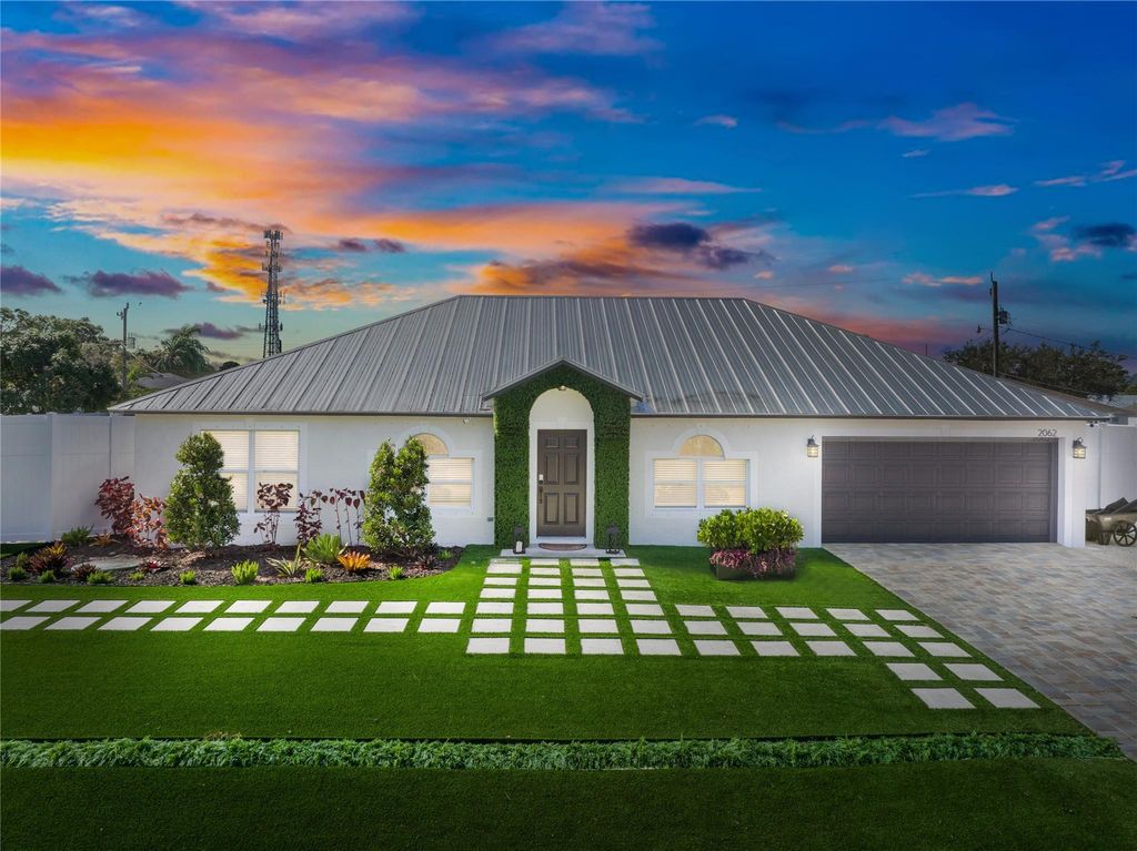 Photo of 2062 SW Larchmont Lane, Port Saint Lucie, FL 34984 (MLS # F10418870)