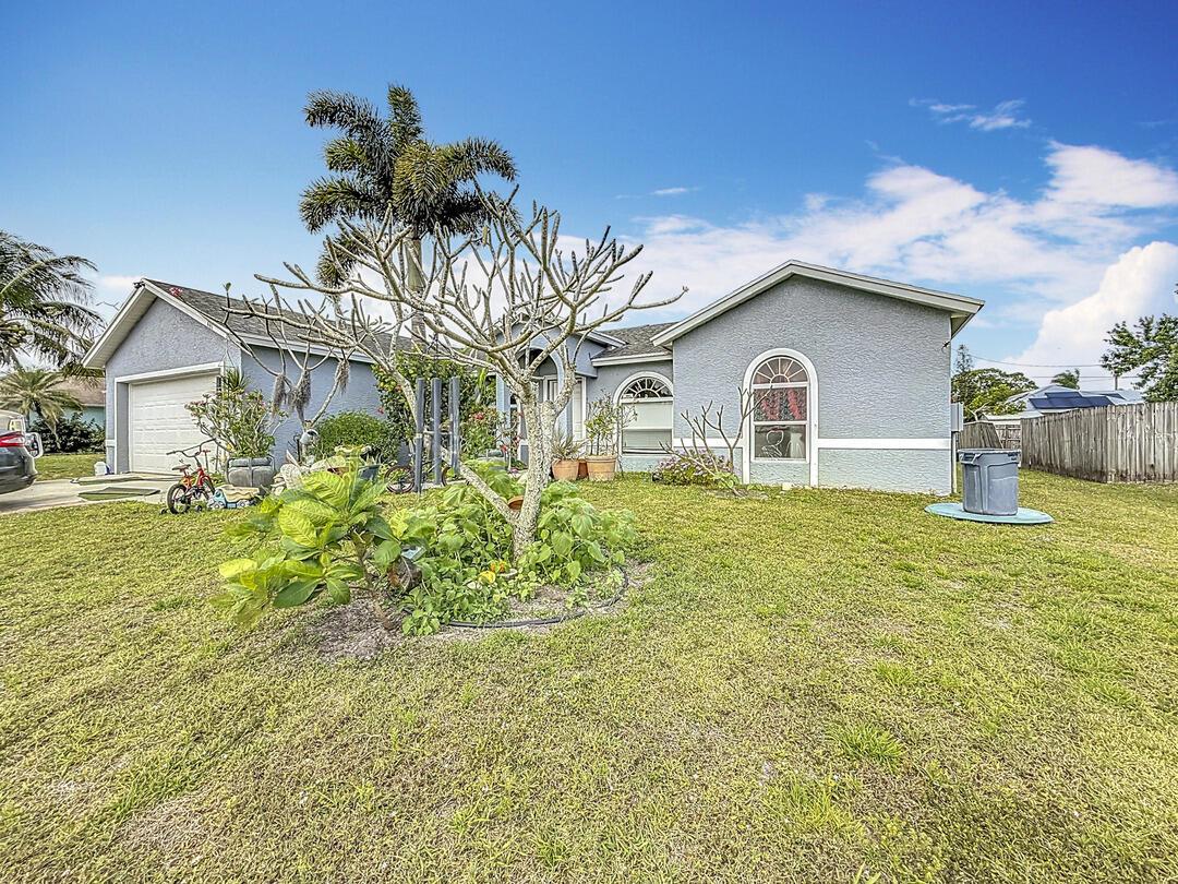 BACK ON MARKET! The deal fell through due to a roof inspection. BRAND NEW ROOF will be installed the week of August 25th! 3 Bedroom 2 bathroom PLUS Den located in the heart of Port St Lucie! Nice lot with plenty of room for a pool. Just minutes away from Crosstown Parkway and the Turnpike.