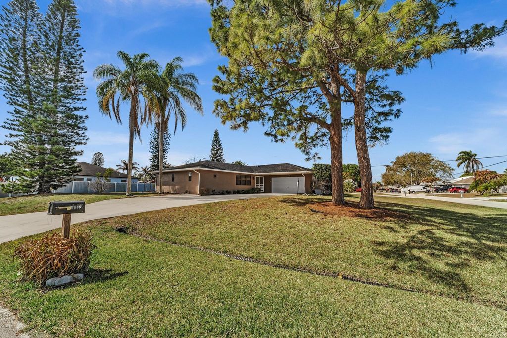 Photo of 2002 SE Aneci Street, Port Saint Lucie, FL 34984 (MLS # F10555667)