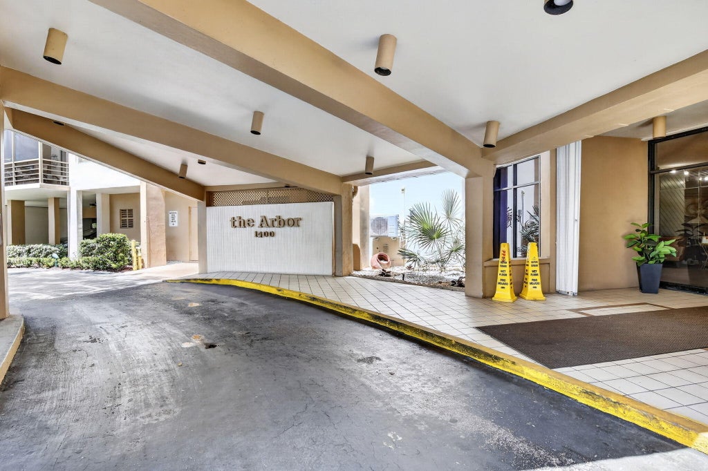 Photo of 1400 Saint Charles Place #313, Pembroke Pines, FL 33026 (MLS # B26072120)