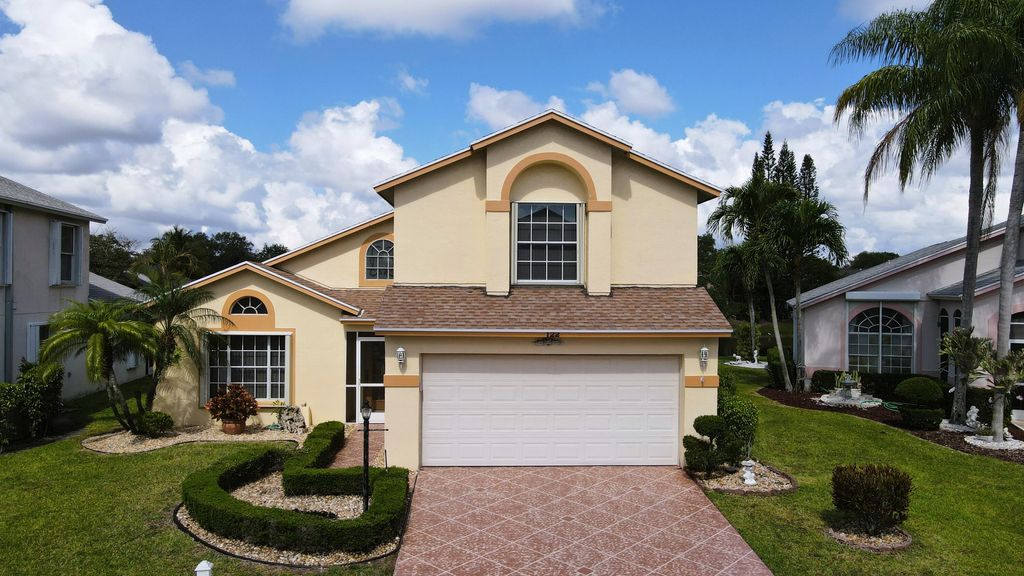 Photo of 122 Hammocks Court, Greenacres, FL 33413 (MLS # R10984316)