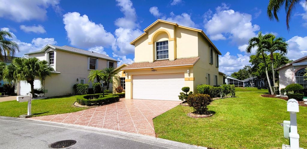 Photo of 122 Hammocks Court, Greenacres, FL 33413 (MLS # R10984316)