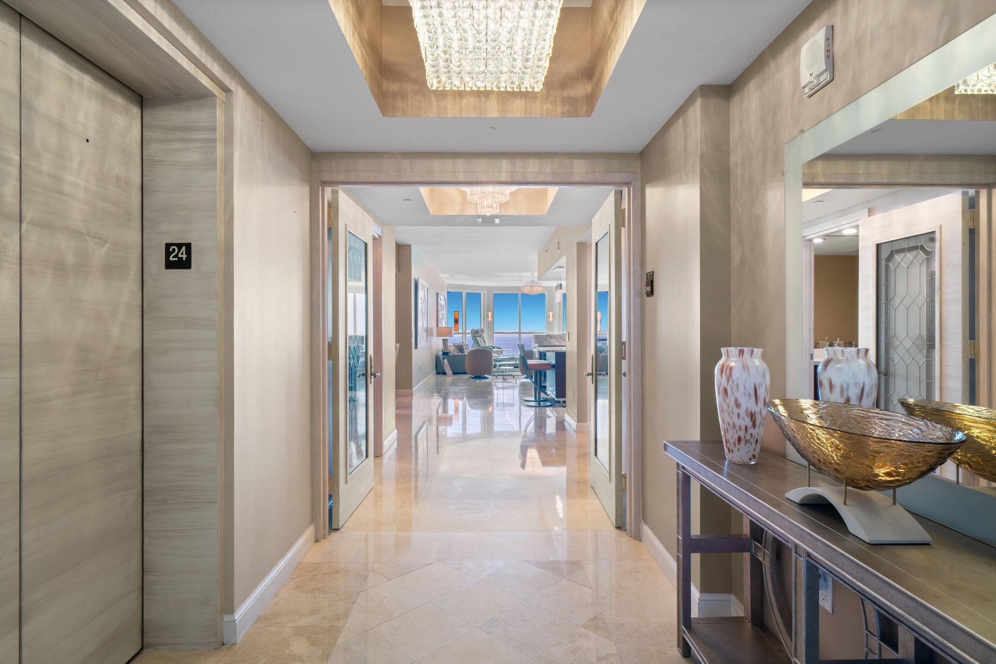 Experience the Top of Oceanfront Luxury in this sought after floor plan located in the highest floor this residence is offered in, showcasing the very best direct Ocean Views and higher ceilings for a grand, airy feel. This rare flow-through 3 Bed+Den, 3 Bath home offers the best of both worlds—an oceanfront terrace with endless Panoramic Ocean Views and a wide open terrace from both guest bedrooms capturing Intracoastal and city skyline views. Substantially remodeled, this residence features an open kitchen with new countertops, updated bathrooms, & custom built-ins to maximize space. Enter through your private foyer into a bright, sophisticated layout designed for both elegance & comfort with floor to ceiling Glass. Rarely available and truly exceptional—schedule your private tour today!