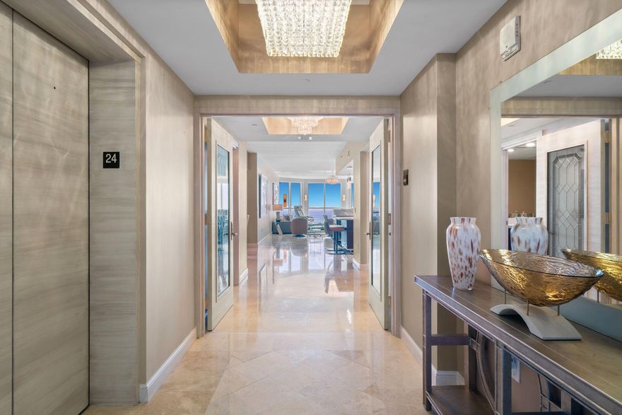 Experience the Top of Oceanfront Luxury in this sought after floor plan located in the highest floor this residence is offered in, showcasing the very best direct Ocean Views and higher ceilings for a grand, airy feel. This rare flow-through 3 Bed+Den, 3 Bath home offers the best of both worlds—an oceanfront terrace with endless Panoramic Ocean Views and a wide open terrace from both guest bedrooms capturing Intracoastal and city skyline views. Substantially remodeled, this residence features an open kitchen with new countertops, updated bathrooms, & custom built-ins to maximize space. Enter through your private foyer into a bright, sophisticated layout designed for both elegance & comfort with floor to ceiling Glass. Rarely available and truly exceptional—schedule your private tour today!