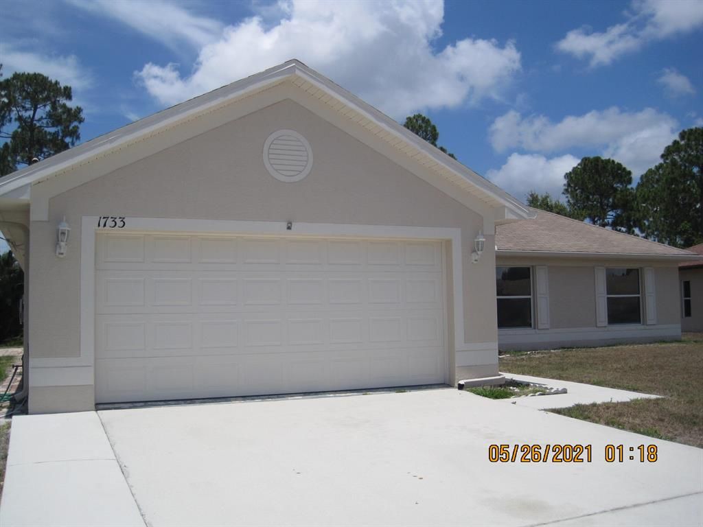 Photo of 1733 SW Penrose Avenue, Port Saint Lucie, FL 34953 (MLS # R10720535)
