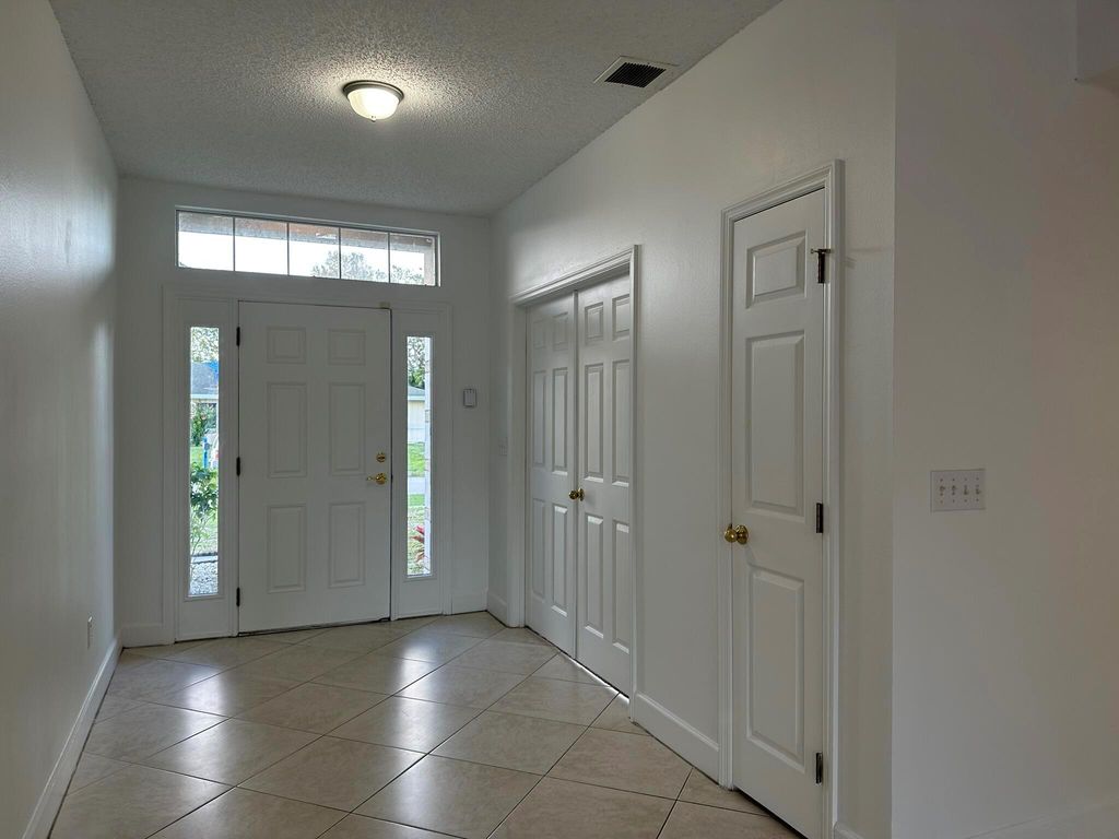 Photo of 880 SW Jennifer Ter, Port Saint Lucie, FL 34953 (MLS # R11046243)