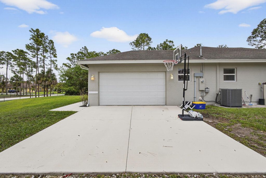 Photo of 14576 N 64th Ct Court N, The Acreage, FL 33470 (MLS # B26004064)