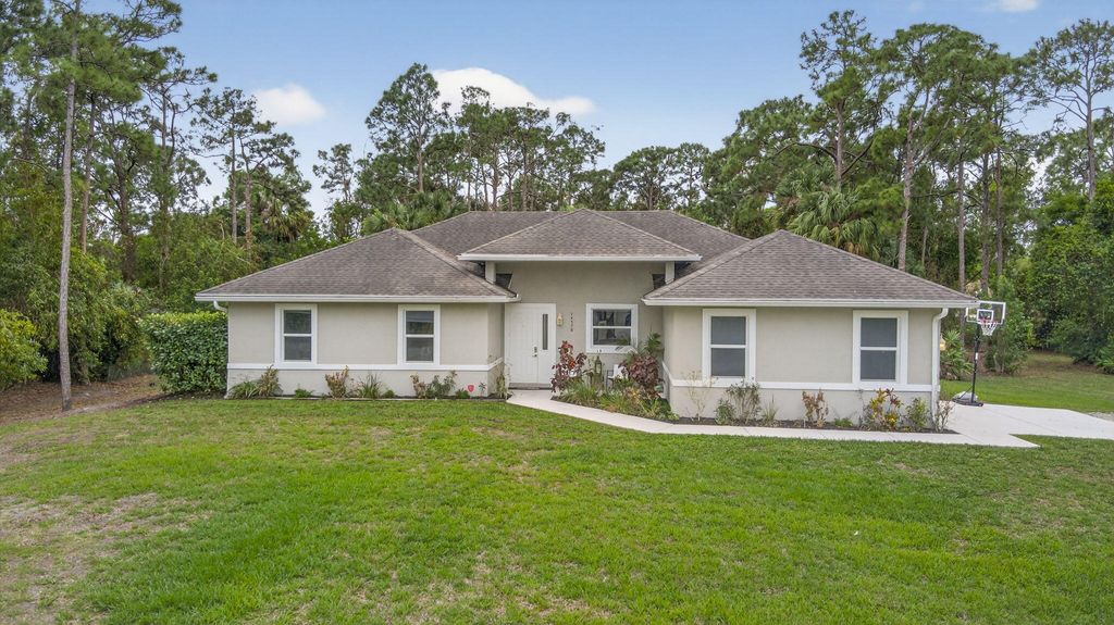 Photo of 14576 N 64th Ct Court N, The Acreage, FL 33470 (MLS # B26004064)