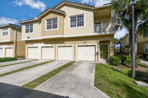 Immaculate 2-bedroom, 2-bath condo with a private garage in a secure gated community! This move-in ready home offers a bright and spacious living and dining area, an open kitchen with plenty of cabinetry and counter space, and a private balcony for relaxing. Conveniently located just minutes from I-95, Florida's Turnpike, shopping, dining, entertainment, and beautiful area beaches--this condo combines comfort, convenience, and an unbeatable location!
