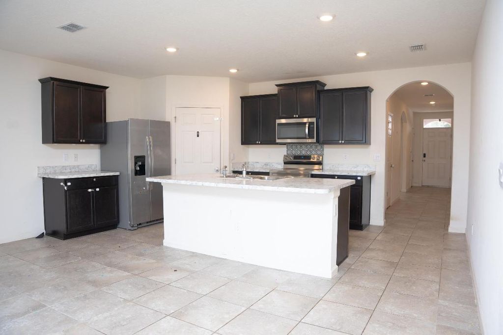 Photo of 789 SW Tulip Boulevard, Port Saint Lucie, FL 34983 (MLS # R11156190)