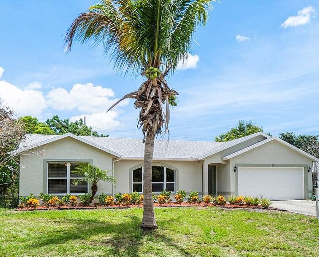Photo of 113 SW Essex Drive, Port Saint Lucie, FL 34984 (MLS # R10993010)