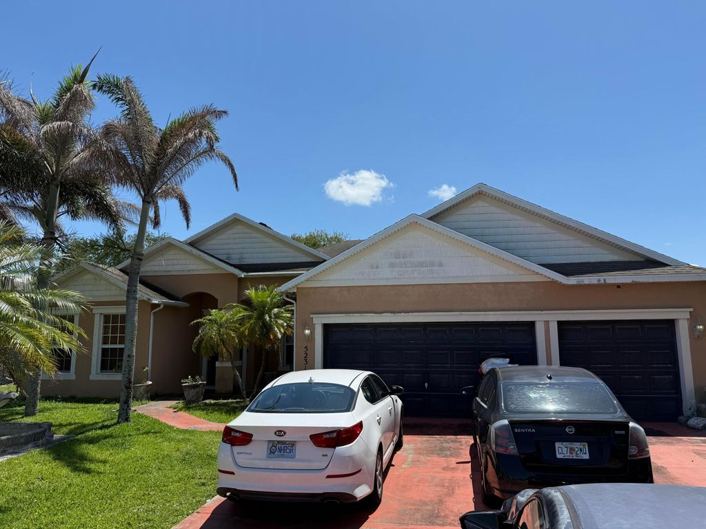 Photo of 5231 NW Reba Circle, Port Saint Lucie, FL 34986 (MLS # B26029594)