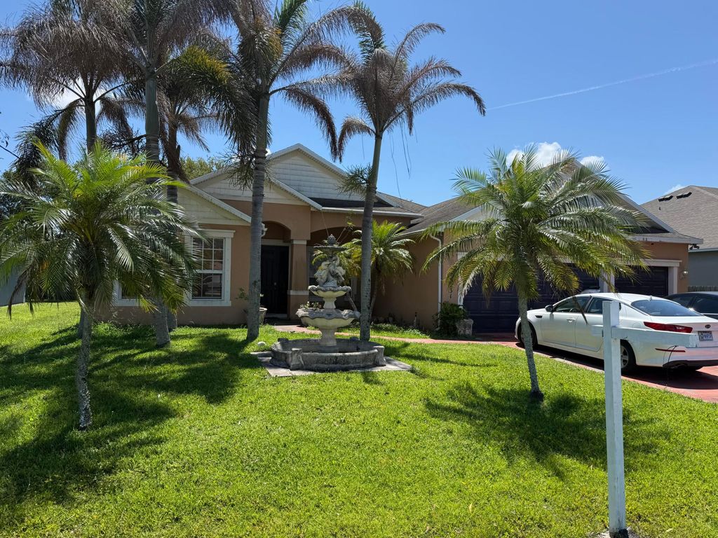 Photo of 5231 NW Reba Circle, Port Saint Lucie, FL 34986 (MLS # B26029594)