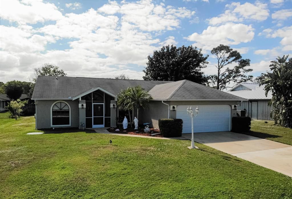 Photo of 890 SE Streamlet Avenue, Port Saint Lucie, FL 34983 (MLS # R10757823)