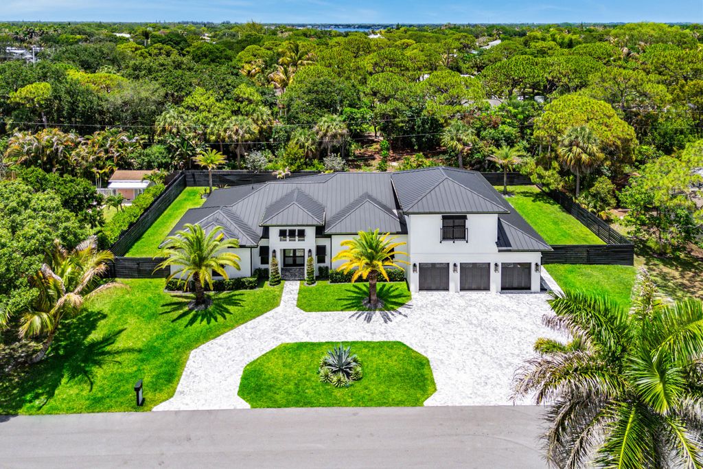 Photo of 5701 Old Orange Road, Jupiter, FL 33458 (MLS # B26034410)