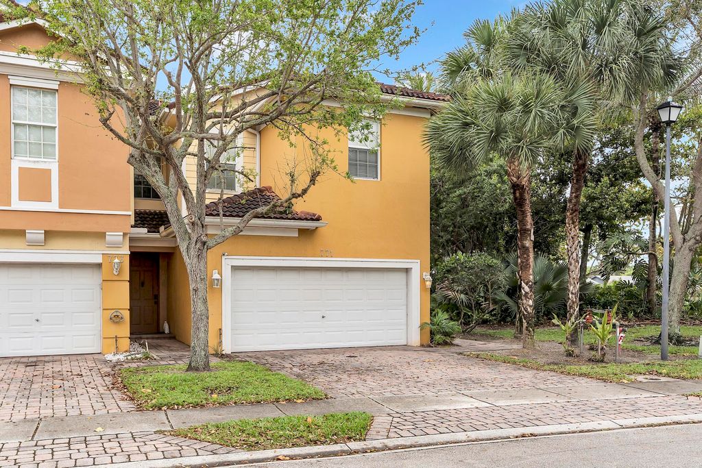 Photo of 771 Pipers Cay Drive, West Palm Beach, FL 33415 (MLS # R11151635)