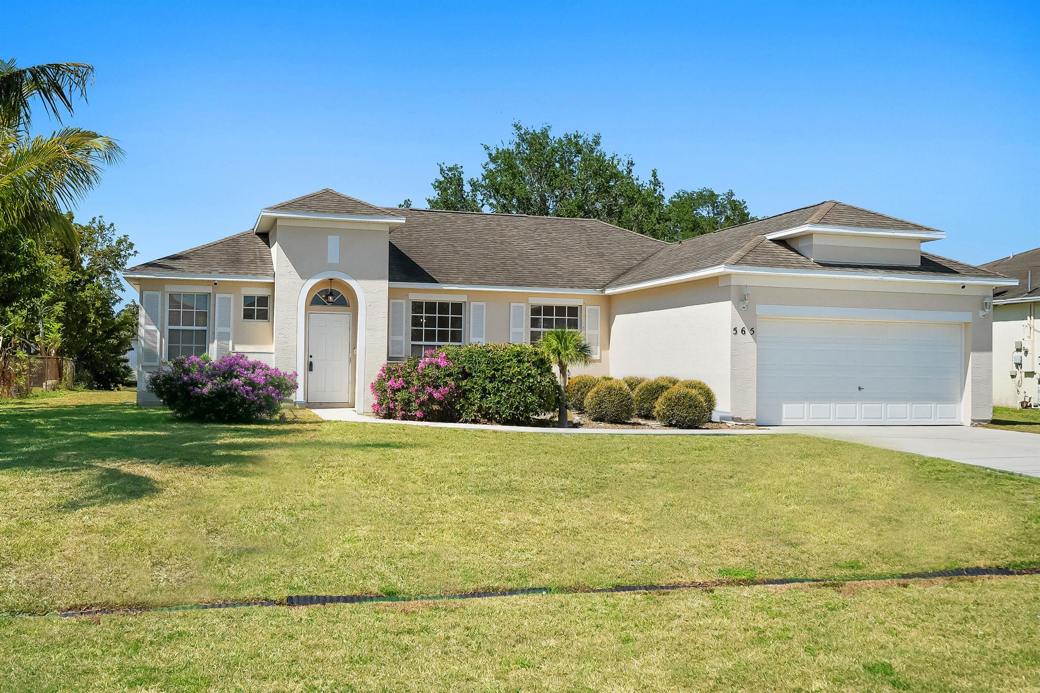 This Concrete Block 4 bedrooms and 2 bathrooms, this home showcases high ceilings, that create an airy, open feel. The fresh interior paint enhances the bright and inviting ambiance. With NO HOA, you have the freedom to personalize your .23 acres, room for pool, RV and boat storage!! Enjoy the convenience of a 2-car garage and take advantage of the updated kitchen and bathrooms with quartz countertops and new white cabinetry ideal for modern living. Built in 2005, featuring 1,650 sq ft of comfortable living space in the heart of Port St. Lucie. This centrally located gem is conveniently situated near I-95, Florida's Turnpike and retail shopping, restaurants, schools, parks and the local beaches. It's minutes away from the brand-new Florida Coast Medical Center opening September 2025.