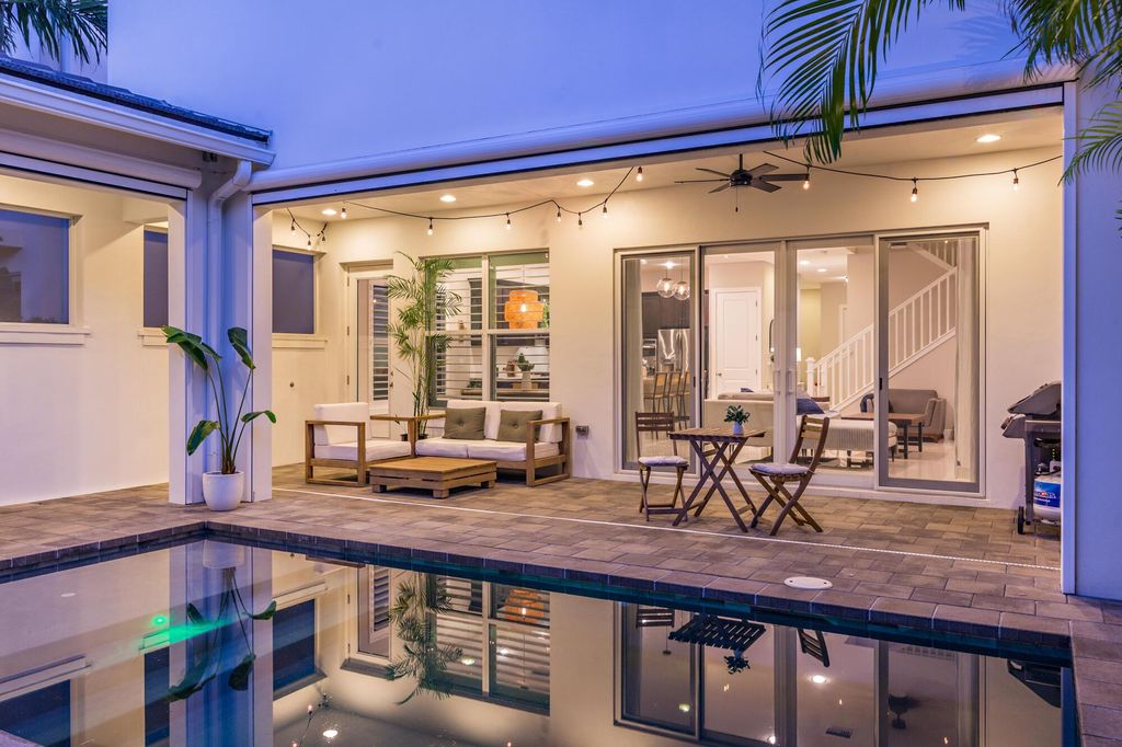 Photo of 5025 Grandiflora Road, Palm Beach Gardens, FL 33418 (MLS # R10994928)