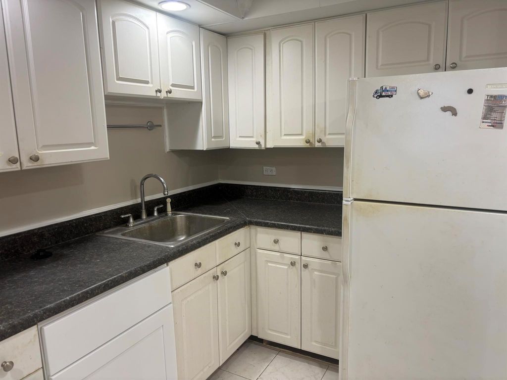 Photo of 3650 Inverrary Drive #1s, Lauderhill, FL 33319 (MLS # R11071500)