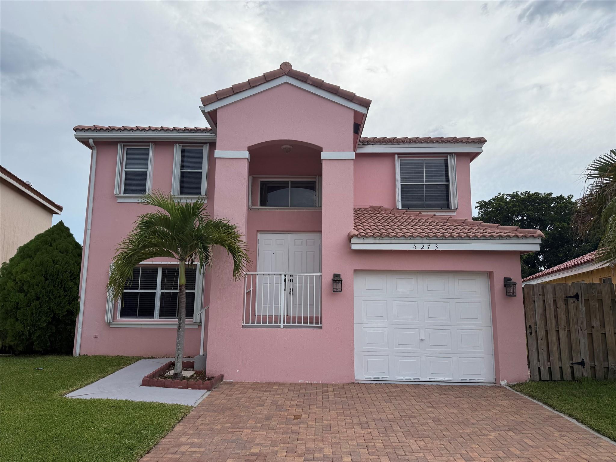 This is a 2 story 3 Bedroom 2 1/2 bathroom. Located in the heart of Davie. Pine Island Bay community is a Family Friendly neighborhood with low HOA. Freshly painted, update kitchen cabinet, and bathroom. bright and cozy. Huge master bedroom with walking closet. 1 car Garage with 2 car driveway. Newer Roof, Accordion Shutters. Enjoy the paved and fenced back yard for BBQ, relax, family gathering, and fence door can lead to Ridge's Park. A-rated School.
