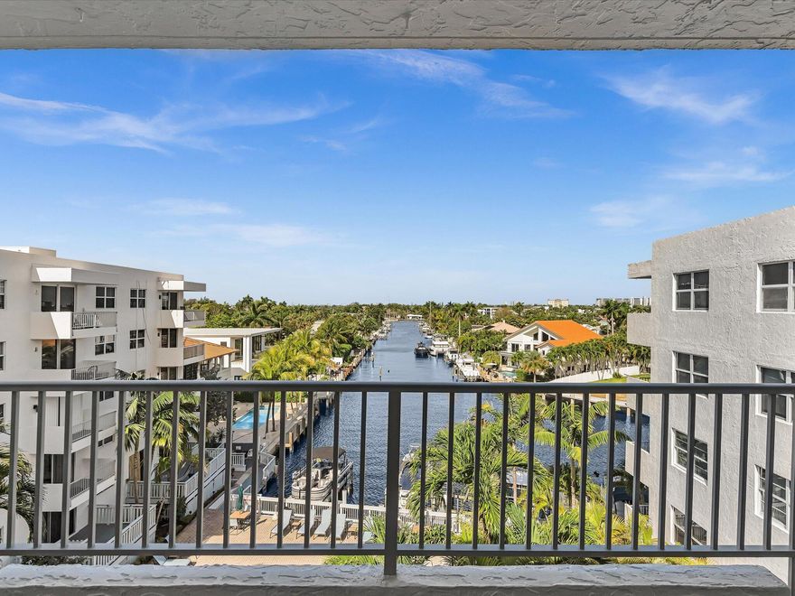 Don't miss this opportunity to own in an investor-friendly community w/ coveted private beach access. This well maintained one-bedroom residence is ideally positioned in a prime location, offering picturesque views of the pool, private marina, intersecting canals, & the Intracoastal.  Looking for peace of mind, the unit features impact glass throughout. Step onto your private balcony to unwind & take in stunning sunset views that create the perfect end to each day.  With a highly flexible rental policy allowing up to 12 leases per year, this property presents a rare opportunity for both investors & seasonal owners alike.  Two parking spaces available (2nd space available for an annual fee).  Whether you're seeking a personal retreat, income-producing property, or both—this is a must-see!