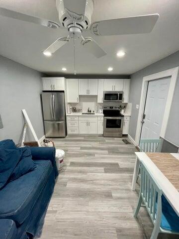 Beautifully redone 1 bedroom, 1 bathroom apartment in the peaceful residential community of Lake Osborne Estates. This unit offers a private entrance, private yard, and private driveway, nestled among single-family homes for a quiet and serene setting. Inside, enjoy a full kitchen with new appliances, a spacious living area, and a huge modern shower. Pet friendly and available furnished or unfurnished to suit your needs. Move-in ready for October. Electric, water, and internet are all included for easy living.