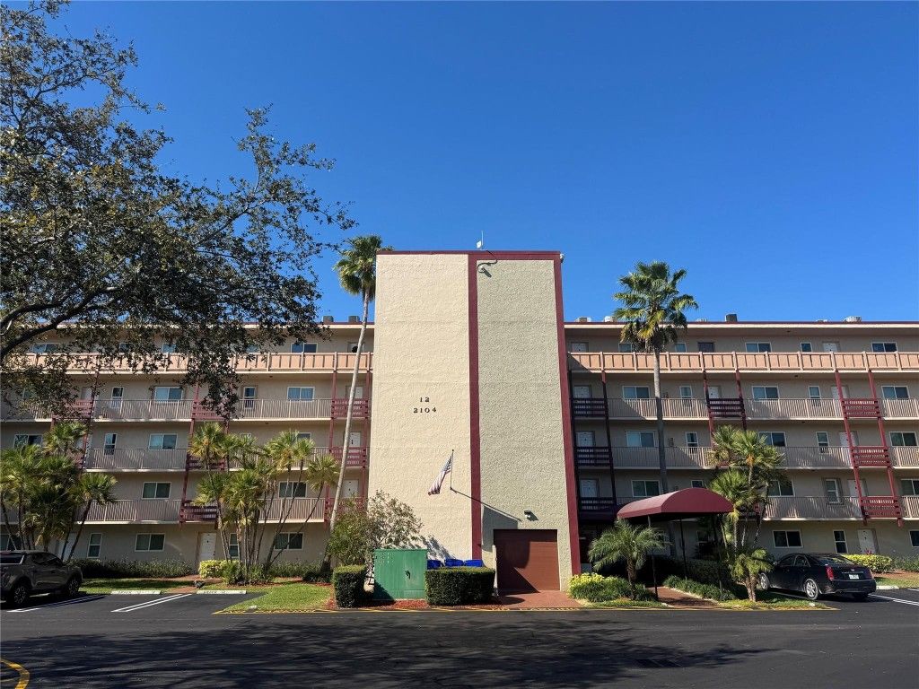 Photo of 2104 S Cypress Bend Drive #404, Pompano Beach, FL 33069 (MLS # F10545487)