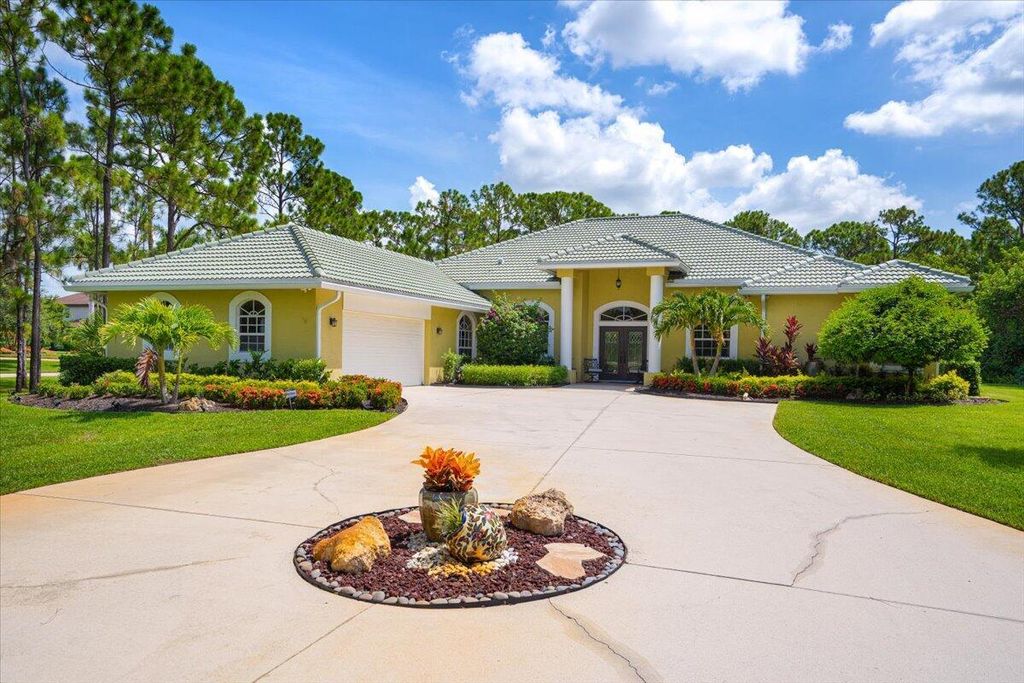 Photo of 11000 Pine Creek Lane, Port Saint Lucie, FL 34986 (MLS # R11106208)