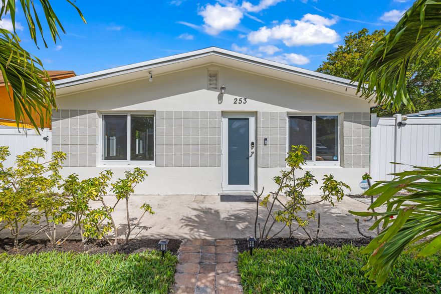 This 4-bed, 2-bath CBS home in Deerfield Beach sits on a 7,499 sq ft lot just 2 miles from the beach with no HOA. At 1,424 sq ft, the home features an updated kitchen, renovated bathrooms, tile floors, a kitchen island, split bedroom layout, and a spacious primary suite with walk-in closet. Major systems are in great shape with a 5-year-old roof, 7-year-old AC and water heater, impact windows and doors throughout, a whole-home generator, new vinyl fence, and indoor laundry. The fenced backyard offers plenty of space to make it your own.