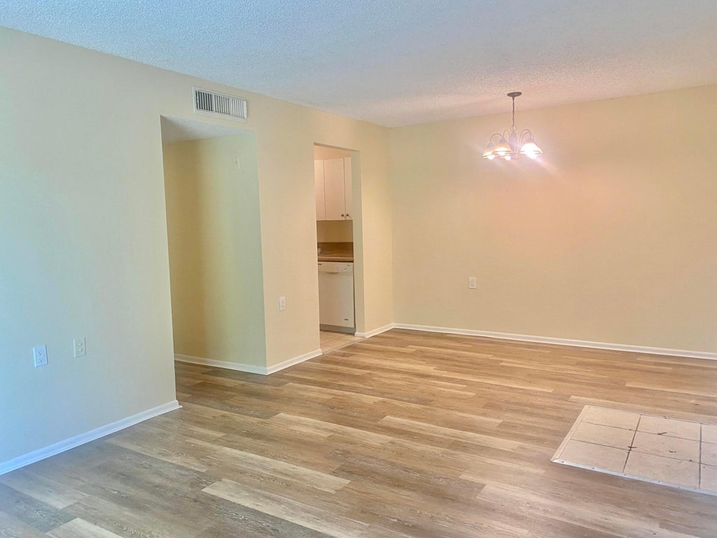 Photo of 1200 LAKE VICTORIA Drive #C, West Palm Beach, FL 33411 (MLS # B26080263)