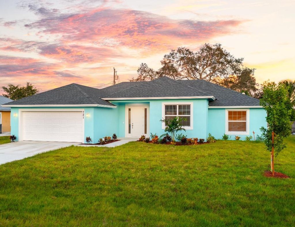 Photo of 721 SW Hogan Street, Port Saint Lucie, FL 34983 (MLS # R10934844)