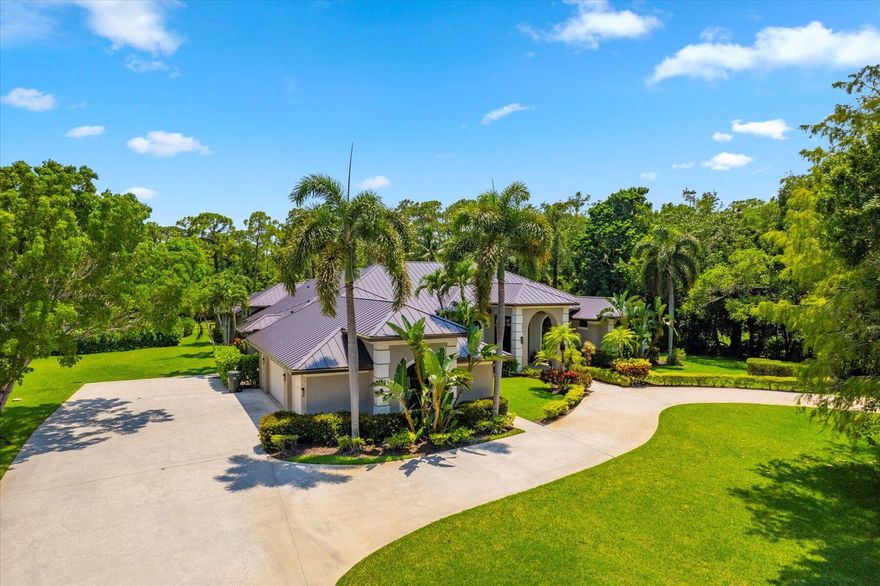 Discover a luxury estate with potential for future equestrian amenities, all the while enjoying the har-tru tennis (or sport) court, home theatre, basketball court, resort style saltwater pool, summer kitchen and fully equipped gym.  Never leave home again! With a new aluminum roof, a whole home generator, complete impact glass windows/doors and upgraded AC system, you can remain worry free in the summer months and throughout the year.  Situated on 1.74 private acres, you will gather in the chefs kitchen, open concept living areas with an indoor/outdoor feel or sneak away to the independent guest house! Paddock Park II is the perfect centralized location for all of your Wellington needs.