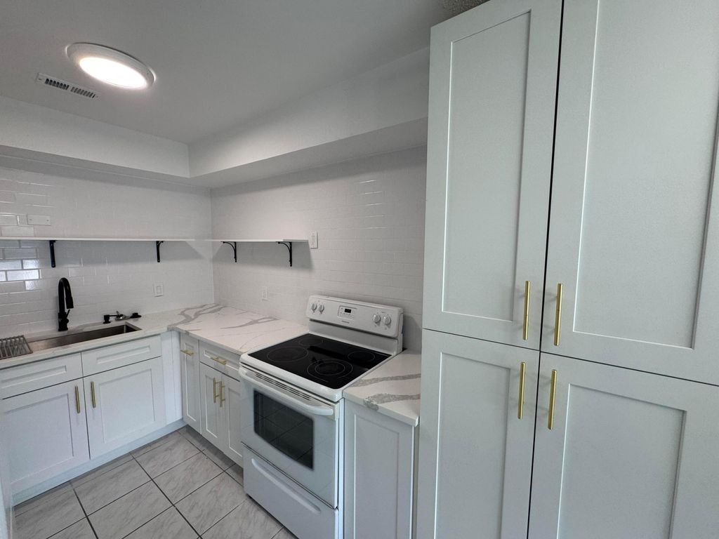 Photo of 243 Castlewood Drive #6, North Palm Beach, FL 33408 (MLS # R11034904)