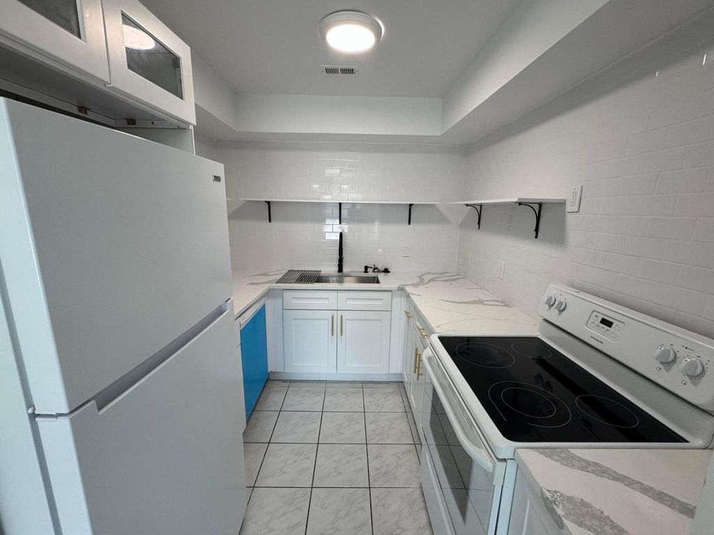 Photo of 243 Castlewood Drive #6, North Palm Beach, FL 33408 (MLS # R11034904)