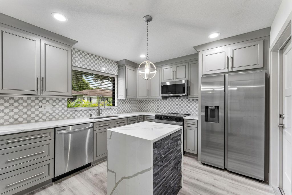 Photo of 4380 Pear Tree Circle #A, Boynton Beach, FL 33436 (MLS # R11149944)