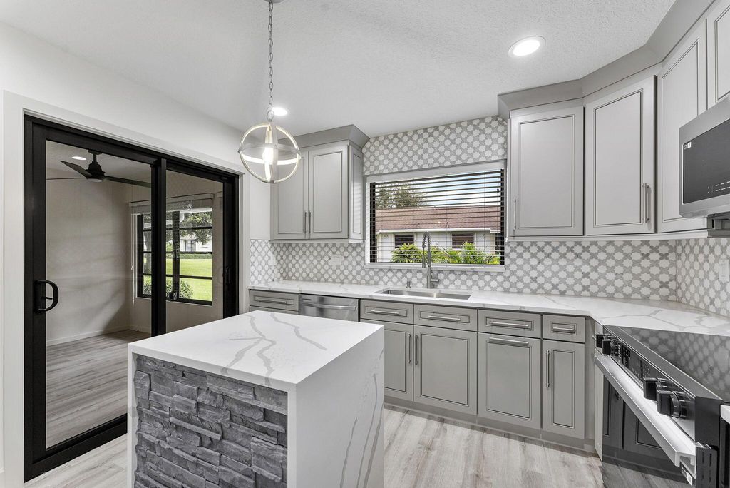 Photo of 4380 Pear Tree Circle #A, Boynton Beach, FL 33436 (MLS # R11149944)