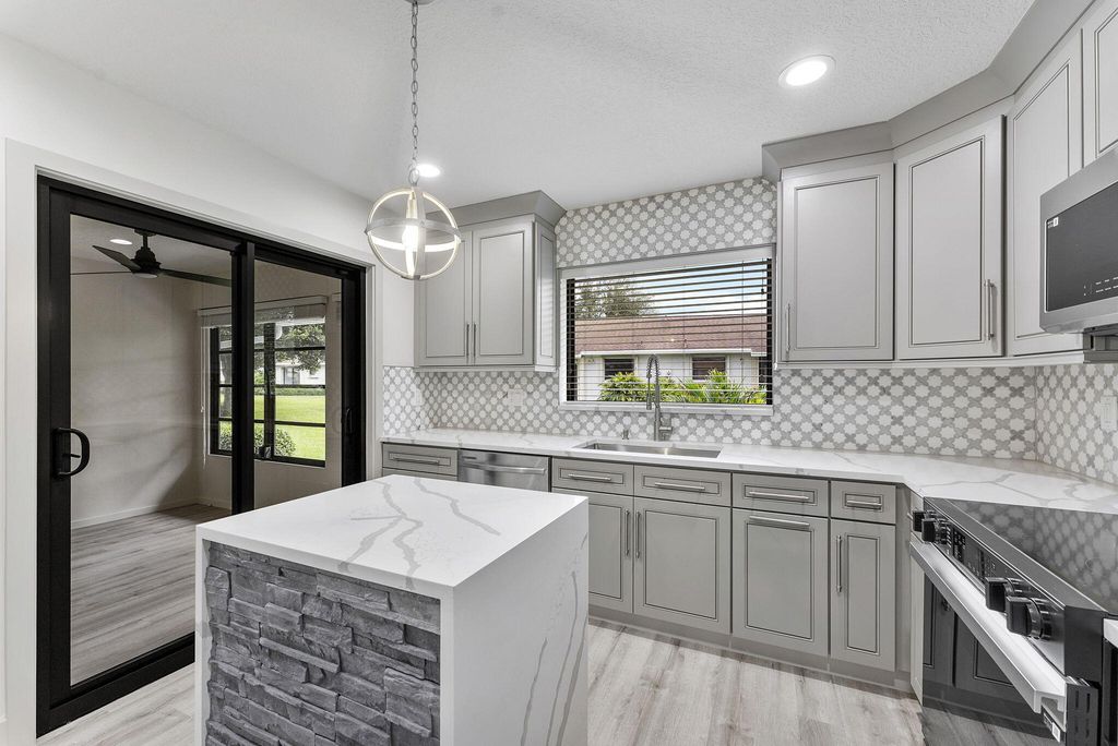 Photo of 4380 Pear Tree Circle #A, Boynton Beach, FL 33436 (MLS # R11149944)