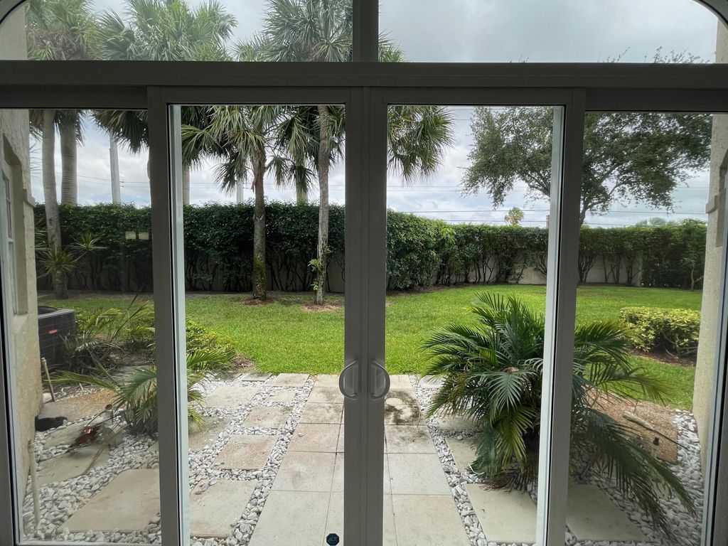 Photo of 6526 Via Regina, Boca Raton, FL 33433 (MLS # B26004657)
