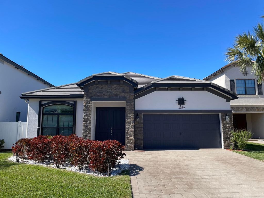 Photo of 5487 Sandbirch Way, Lake Worth, FL 33463 (MLS # R11160086)