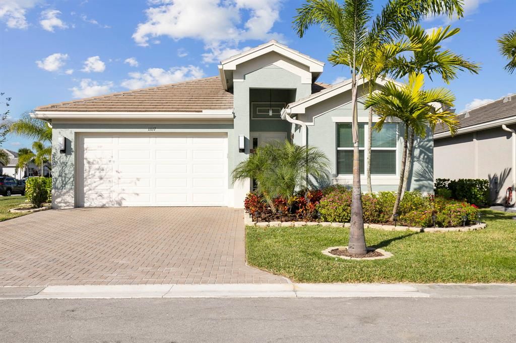 Photo of 11117 SW Carriage Hill Lane Ln, Port St Lucie, FL 34987 (MLS # R10763079)