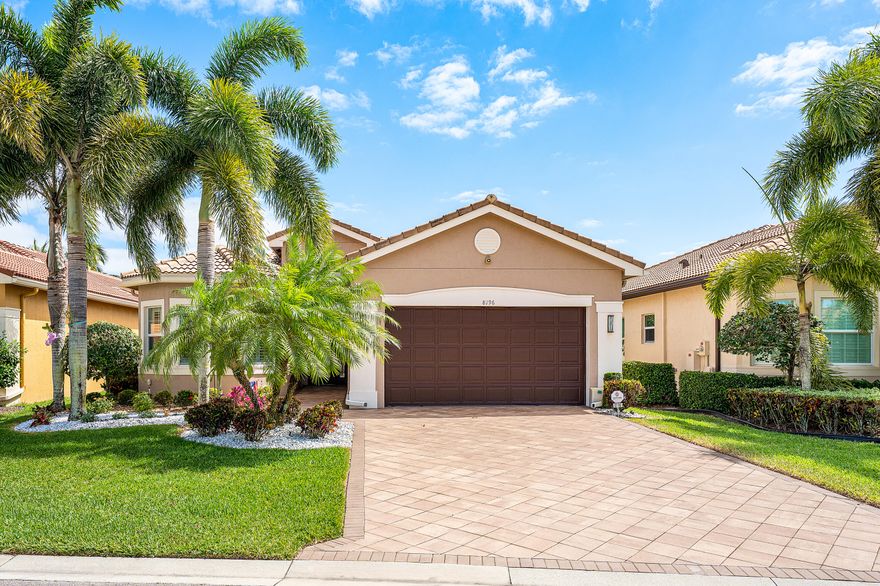 This lushly landscaped Bimini model sits on a lakefront lot backing south. The home (3BR+den,3BA) has impact windows, whole house generator & surge protector, new or newer a/c & appliances, etched glass entry door & screen, 24" porcelain tile, hi-hats, fans, crown moldings, designer light fixtures & window treatments, custom closets, upgraded baths & more! The kitchen has contemporary cabinets, quartz countertops, glass tile backsplash, glass display cabinets with stainless trim, split oven & much more! Dine at the counter depth snack bar with pendant lights, separate breakfast area or dining room. Large great room with built-in shelves for display. Primary suite with luxurious bath. Den w/built-in desk. Extended wraparound patio has hurricane screen & birdcage w/picture frame screen! Additional Special Features - electric hurricane screens at rear patio covered area - newer Daiken A/C - 2023  plus 10 year warranty on parts and labor, new oversized LG front load washer and dryer with service contract, new GE Profile microwave and GE Profile dishwasher with service contracts, whole house wired ethernet, data ports, upgraded security system - Vector cell network, Fiber internet, 500 gallon propane tank for generator plus APS service contract, "Smart" Outdoor lights, Toto toilets, Murphy Bed with Ethan Allen bookcases In Guest Bedroom. Valencia Cove is a premier 55+ lifestyle community featuring a spectacular 39,000 square-foot clubhouse and 10 acre outdoor recreational facility. Endless activities and opportunities for fun abound - there are activities, trips, shows, and clubs of all types. The clubhouse features an expansive foyer and lobby, grand ballroom with raised stage and dance floor, four spacious card rooms, Cafe with indoor/outdoor seating, Arts and crafts room with kiln, Internet/Billiards room, Office, Catering kitchen with separate demonstration cooking studio, Yoga & exercise studio with ping pong, fully equipped fitness center and men's and women's locker rooms with steam rooms, massage room and showers. There are four pools - a beautiful Resort-style pool and Shade Pavilions, Lap pool with Swimmers' Lap Lanes, Resistance walking pool, Grandchildren's wading pool, and an Outdoor whirlpool spa. There are eight har-tru tennis courts with shade pavilions and lighting for night play, tennis pro shop, tennis pro, league play, six pickleball courts, pickleball pro, league play, 2 bocce courts, league play, half-court basketball and walking/jogging/biking paths throughout and just outside the community. Valencia Cove is conveniently located near shopping, restaurants, houses of worship and major highways!