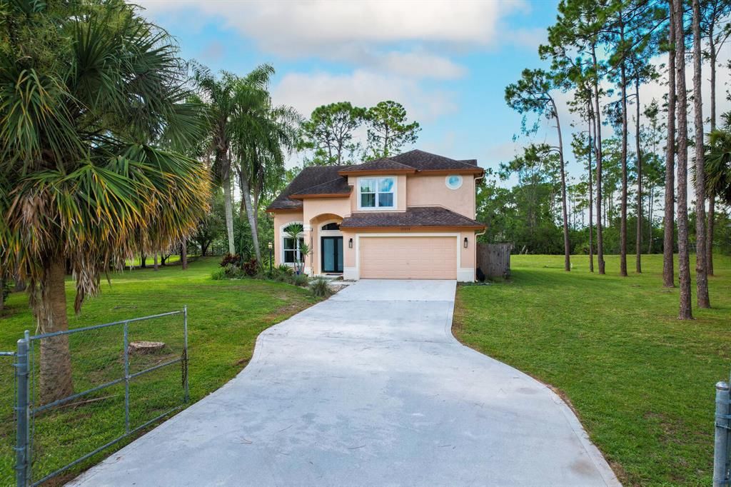 Photo of 15324 78th Place N, Loxahatchee, FL 33470 (MLS # R10737981)