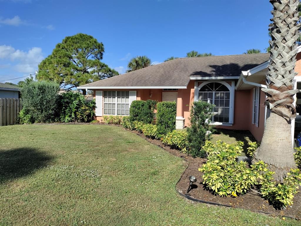 Photo of 909 SW Longfellow Road Rd, Port St Lucie, FL 34953 (MLS # R10767766)