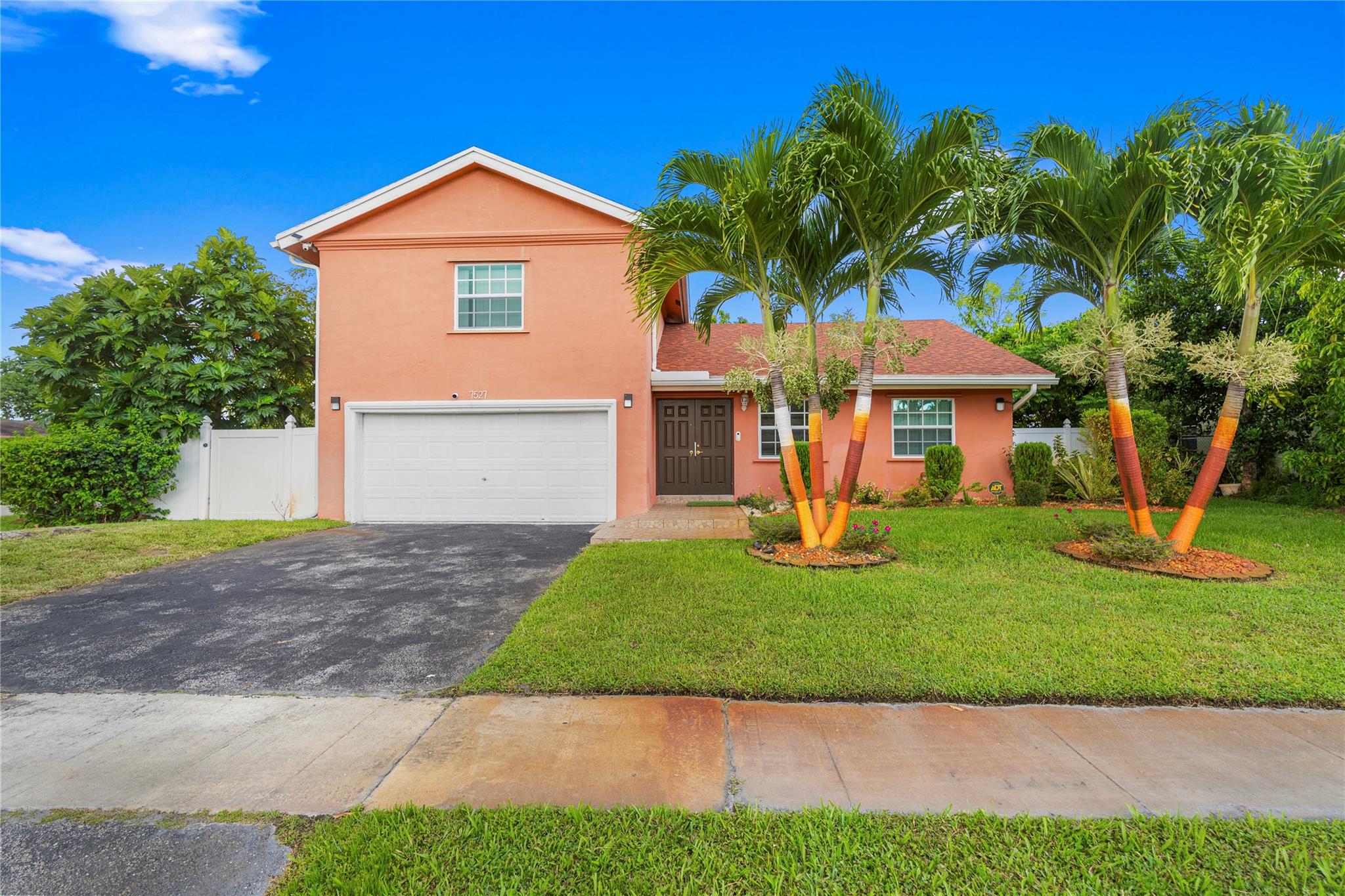 Welcome to this beautifully renovated 4/3 single-family home situated on a desirable corner lot in North Lauderdale. Offering the perfect blend of style and comfort, this spacious residence boasts a 5-year-old roof, impact windows and doors, two AC units (upstairs 3 years old, downstairs 6 years old) for year-round efficiency. The stunning kitchen updated in less than 4 yrs features rich wood cabinetry and granite contertops. Tile flooring downstairs and laminate upstairs, plus a newer PVC fence for added privacy. water heater 2022. Tropical Fruit trees in the backyard. NO HOA! Ideally located near shopping, dining, schools, and major highways, this move-in ready gem offers exceptional value and convenience in a prime location. Don’t miss your chance to call this beautiful home yours!