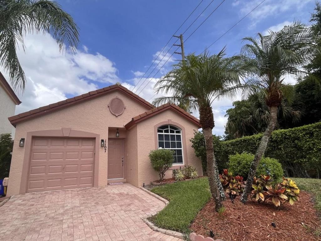 Photo of 1107 Via Jardin, Riviera Beach, FL 33418 (MLS # R11134085)